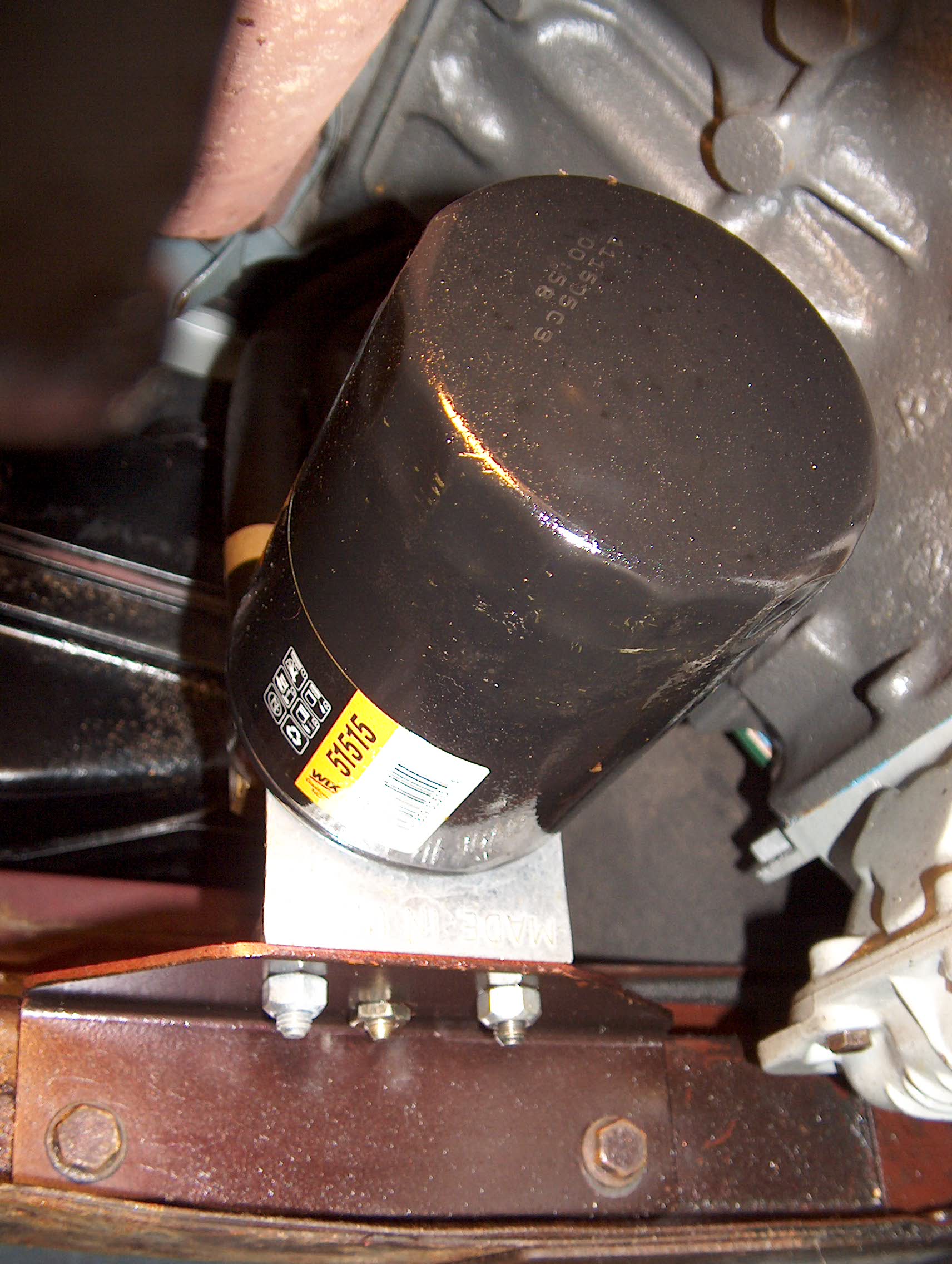 The oil filter located in place of the intake resonator.